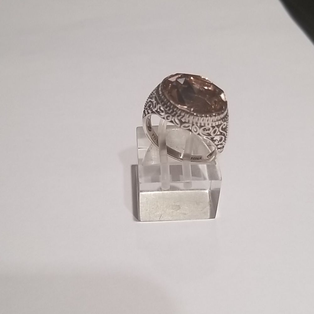 Lady's silver vintage style ring with pink stone